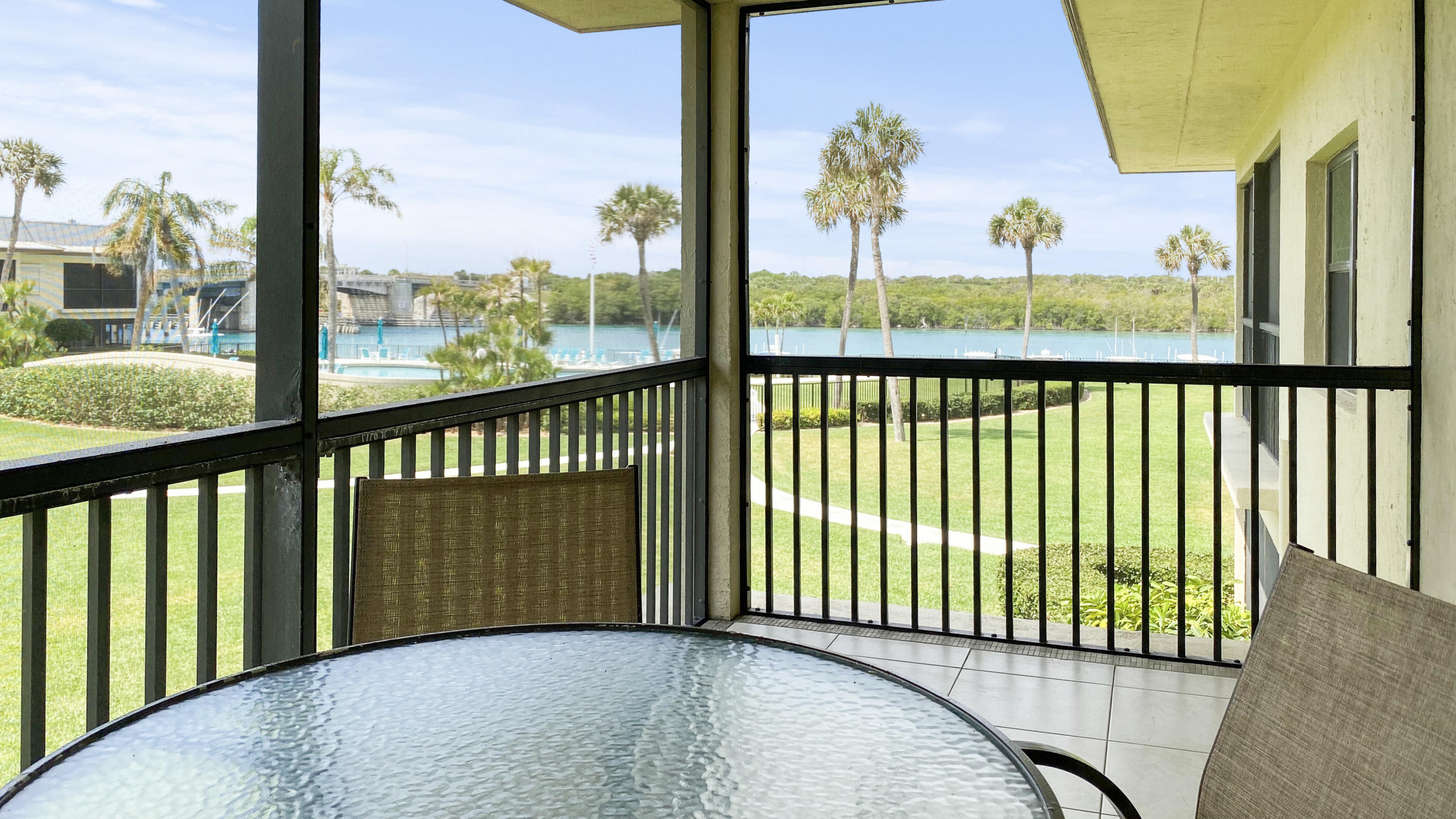275 South Beach Road, Unit B202 Jupiter, FL 33469 - Photo 17 of 25 a view of a porch with a floor to ceiling window