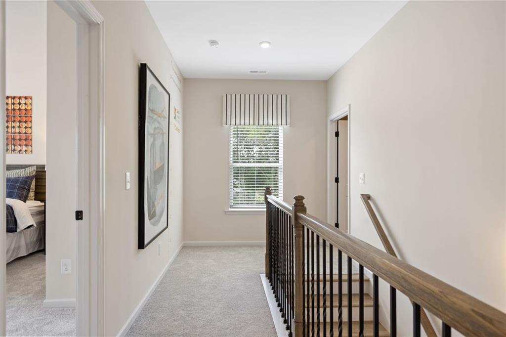 11 Willow Circle Rock Spring, GA 30739 - Photo 21 of 40 a view of a hallway with windows and stairs