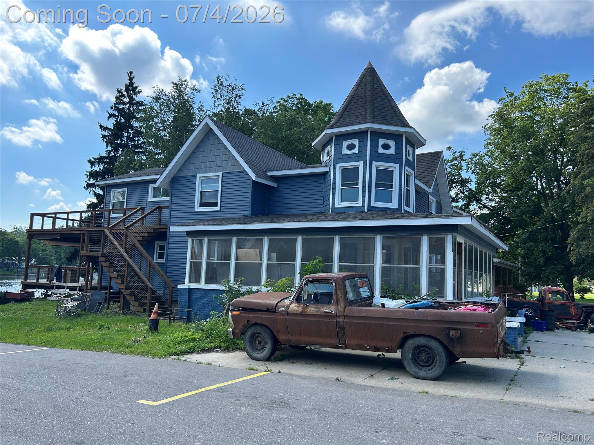 All Sports Lobdell Lake Front! Victorian Classic Home Over 3,000 sq ft. 5 Bedrooms. 3 Baths!