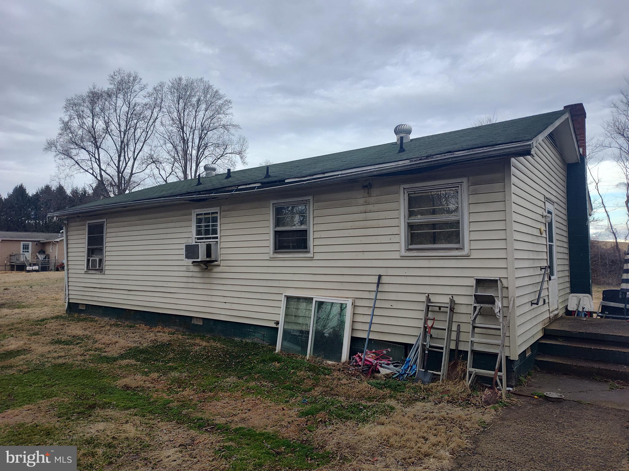 8438 Monumental Mills Road Rixeyville, VA 22737 - Photo 2 of 4 a view of a house with a yard