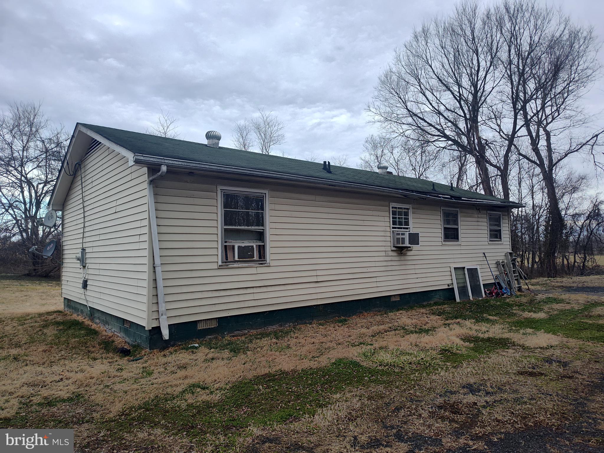 8438 Monumental Mills Road Rixeyville, VA 22737 - Photo 3 of 4 a view of a house with a backyard