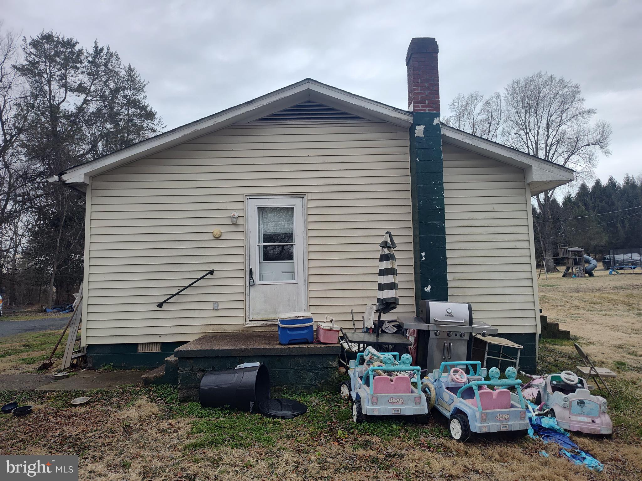 8438 Monumental Mills Road Rixeyville, VA 22737 - Photo 4 of 4 a view of a backyard with sitting area