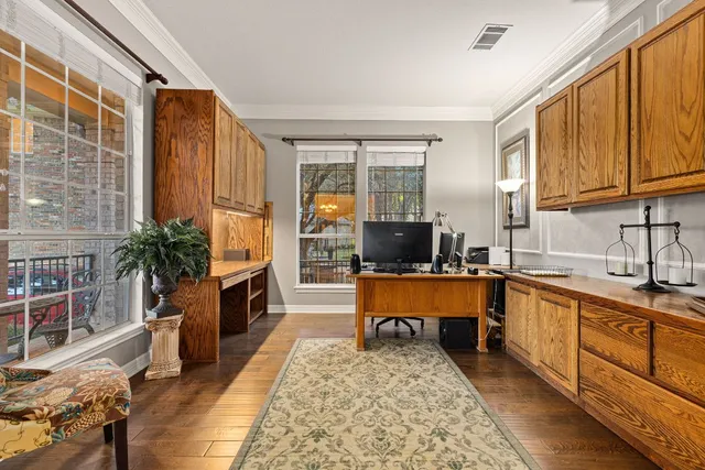 a view of a livingroom with furniture and stairs