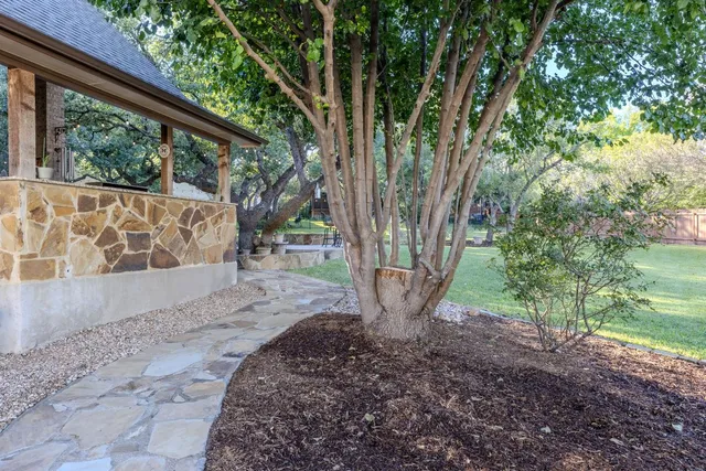 a view of a garden with trees