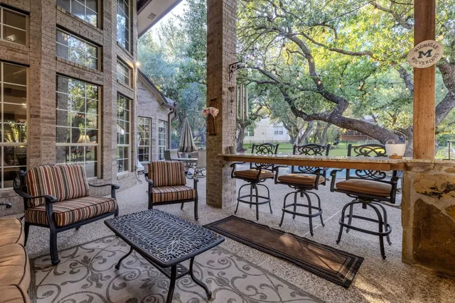 a outdoor living space with patio furniture and a potted plant