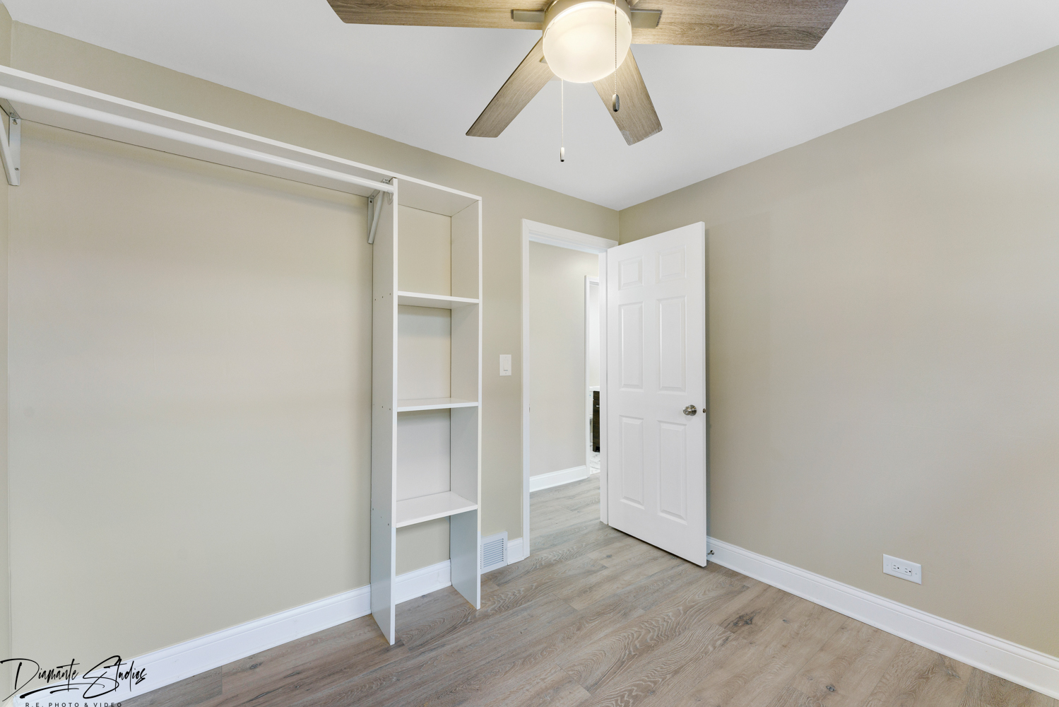 244 North Wolf Road Hillside, IL 60162 - Photo 5 of 12 a view of empty room with wooden floor