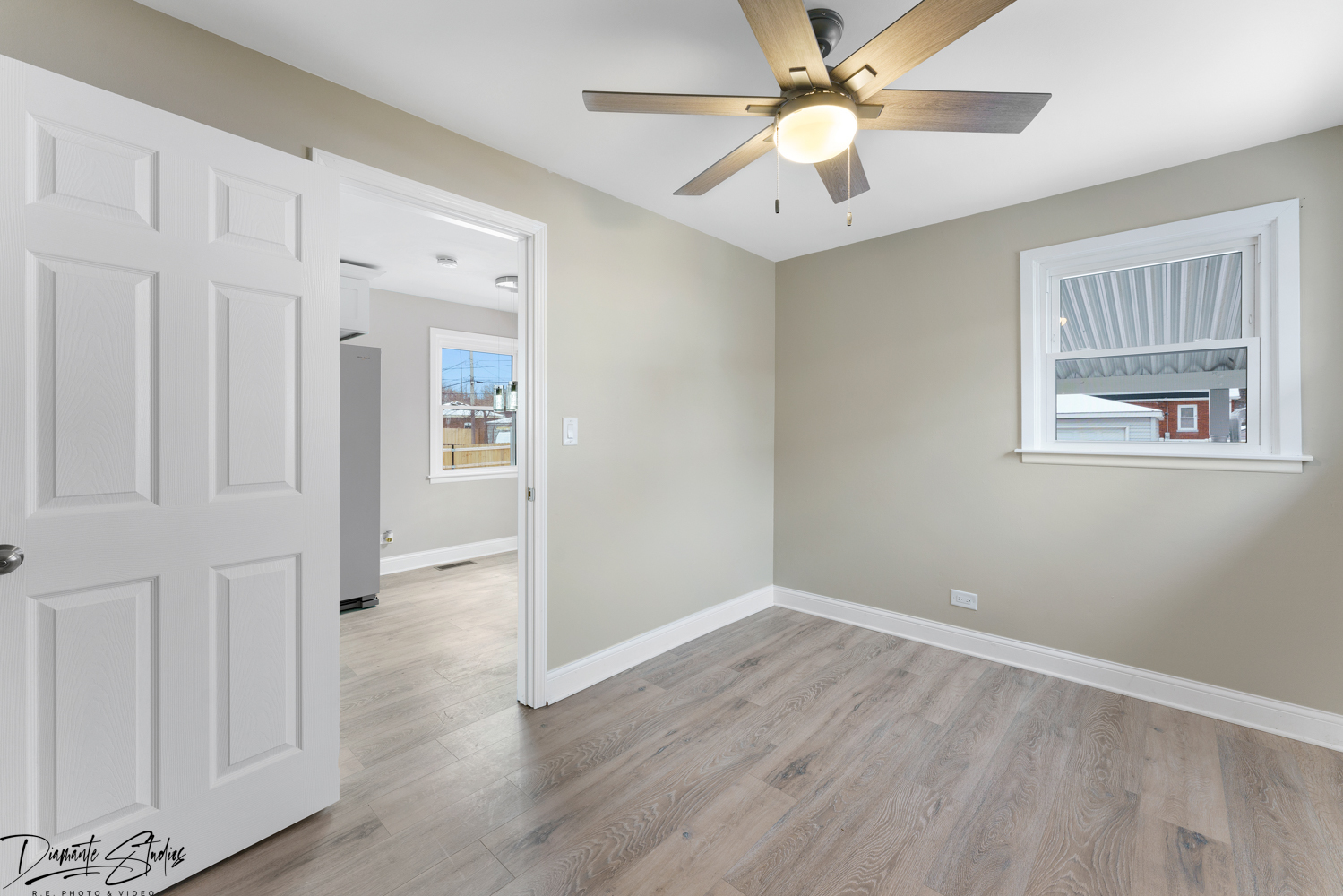 244 North Wolf Road Hillside, IL 60162 - Photo 8 of 12 wooden floor in an empty room with a window