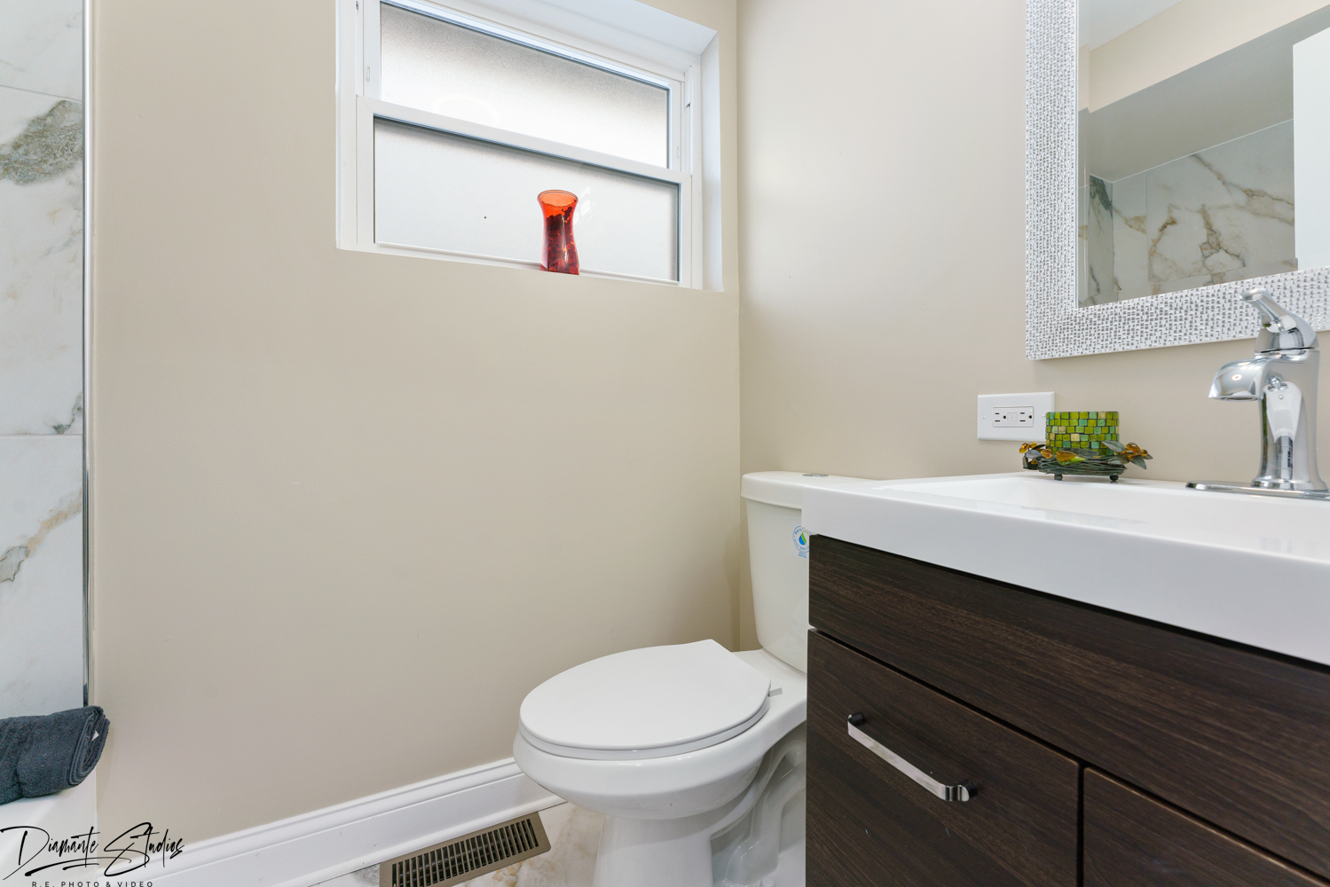 244 North Wolf Road Hillside, IL 60162 - Photo 10 of 12 a bathroom with a toilet and a sink