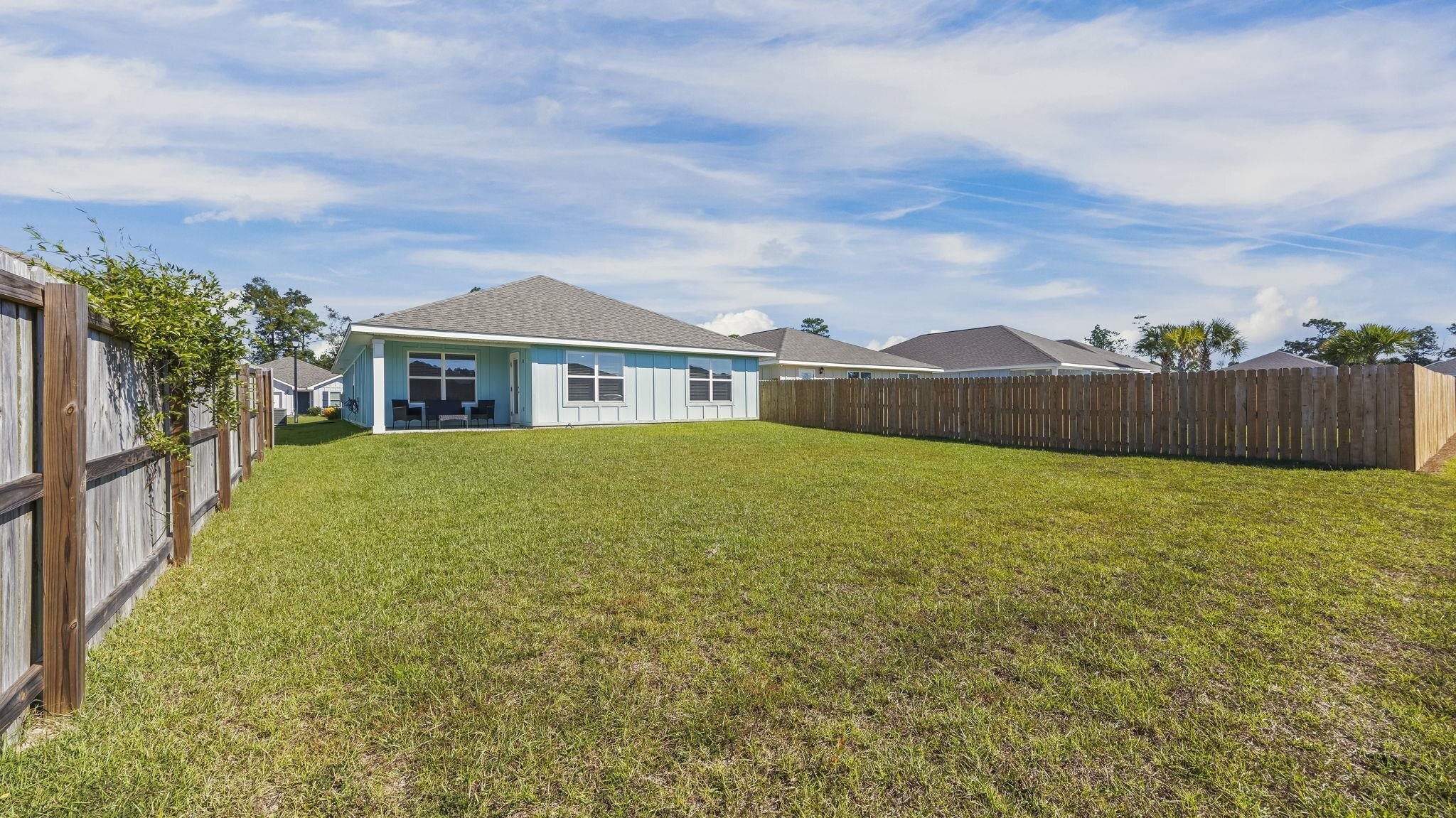 224 Burnston Way Foley, AL 36535 - Photo 36 of 42 Fenced backyard with a patio area