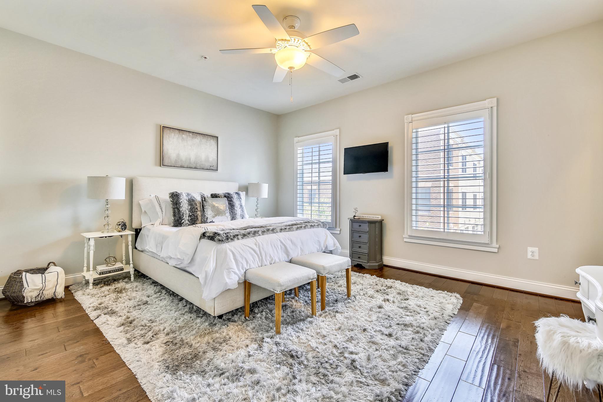 1411 Ridgeview Way Washington, DC 20007 - Photo 22 of 43 a spacious bedroom with a bed and a window