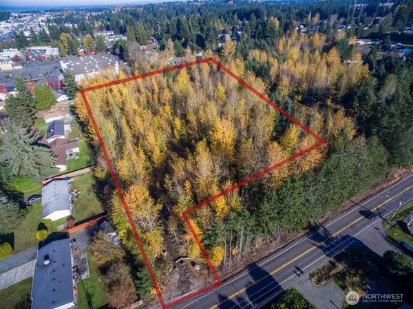 an aerial view of house with yard