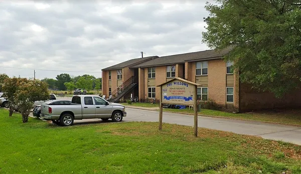 a house view with a garden space