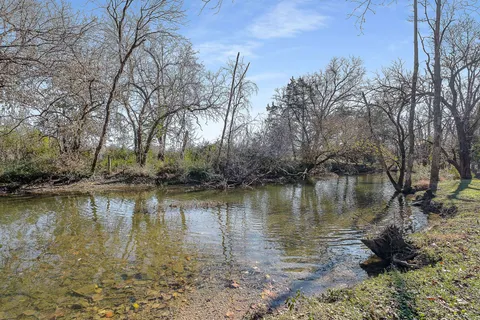 a view of a lake with houses