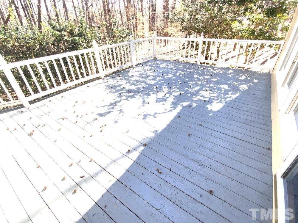 12020 Old Creedmoor Road Raleigh, NC 27613 - Photo 29 of 30 a view of wooden floor with a bench
