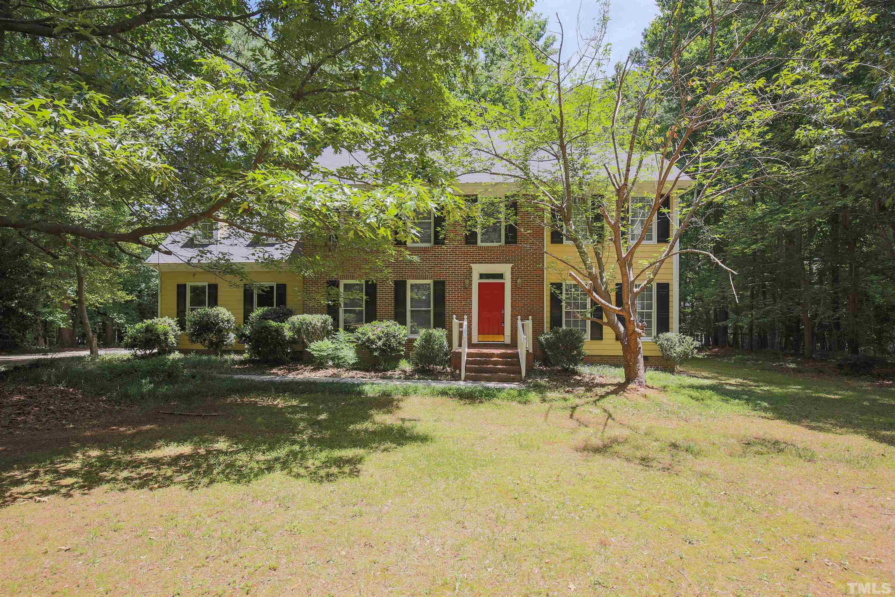 12020 Old Creedmoor Road Raleigh, NC 27613 - Photo 30 of 30 a view of a house with backyard porch and sitting area