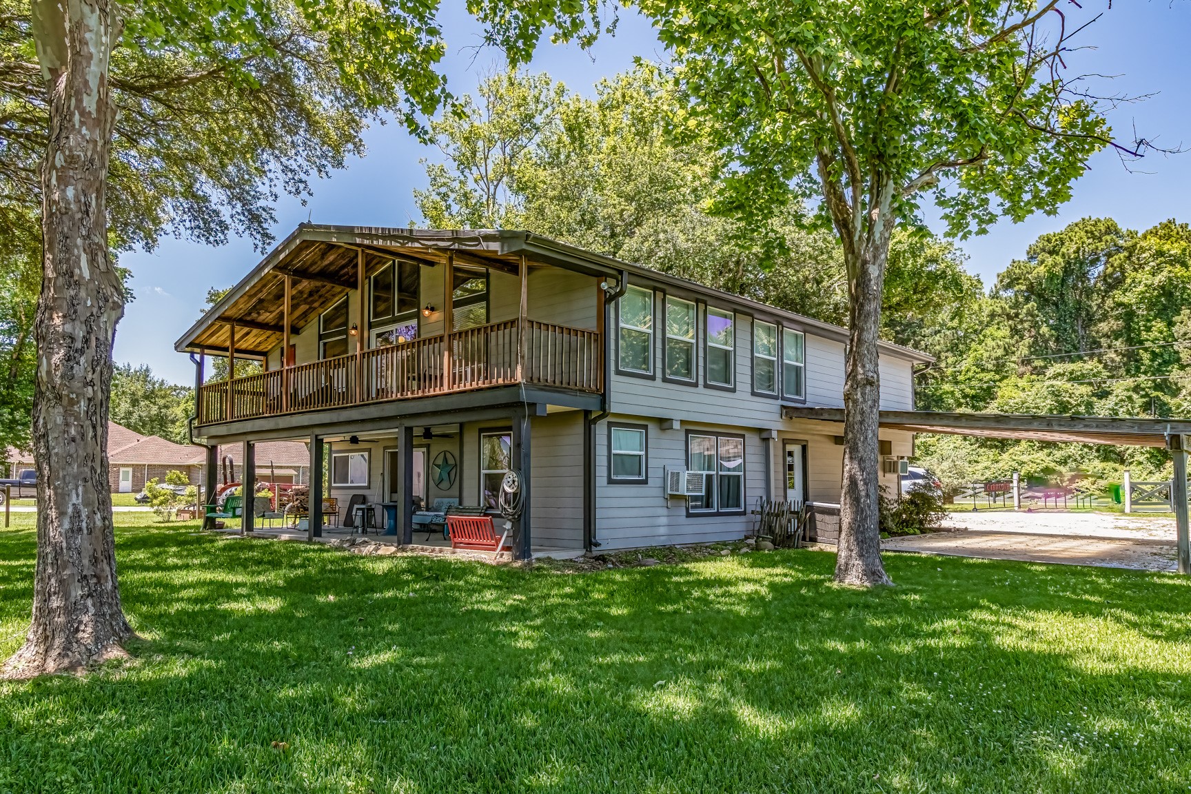 480 Johnson Road Coldspring, TX 77331 - Photo 9 of 49 Beautifully shaded yard area for all of your outdoor entertaining