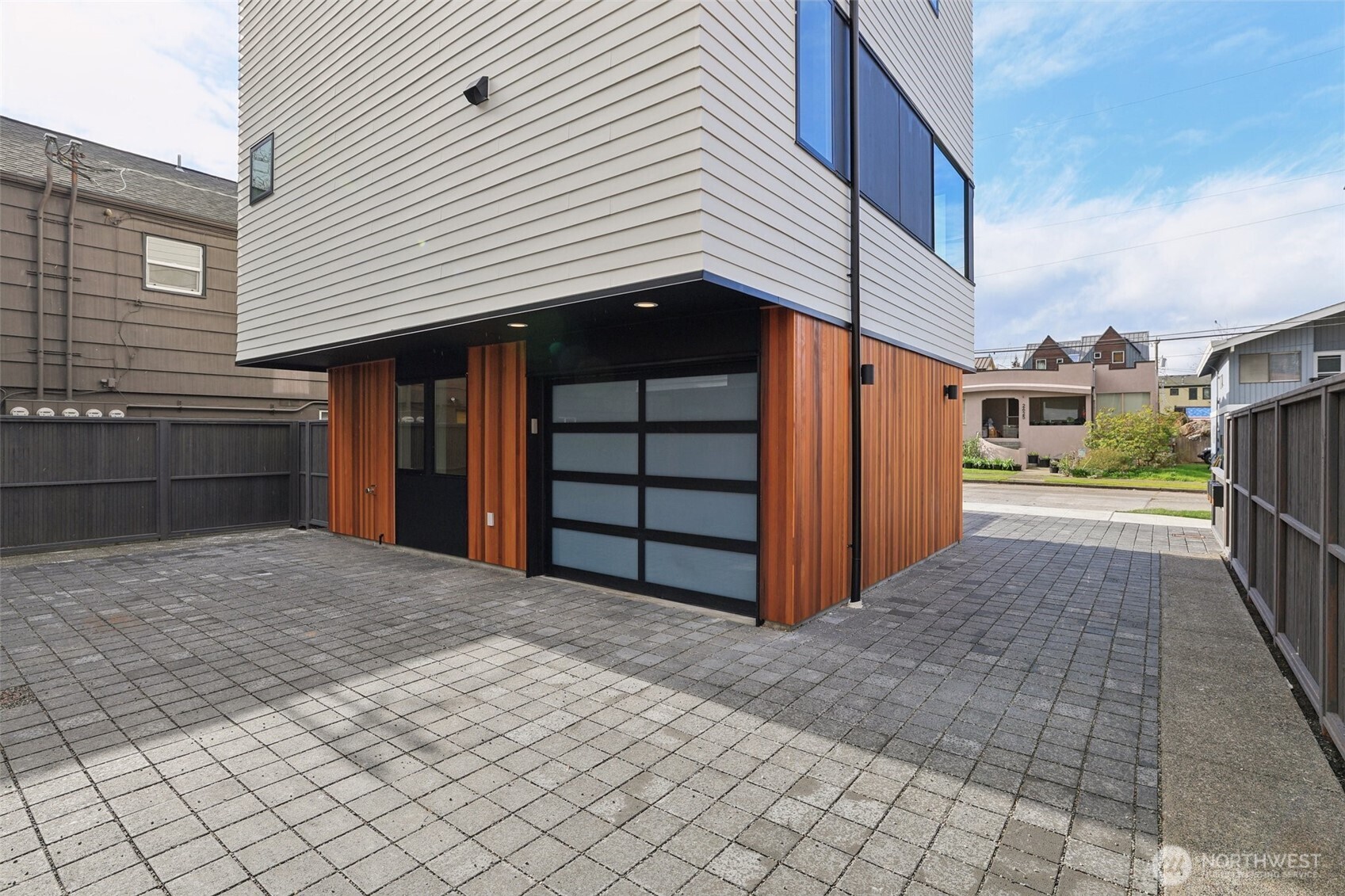 2628 58th Avenue Southwest Seattle, WA 98116 - Photo 29 of 40 a view of a house with a garage