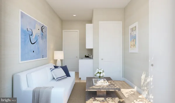 a living room with furniture and a table