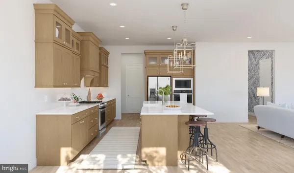 a large kitchen with kitchen island a sink stainless steel appliances and cabinets