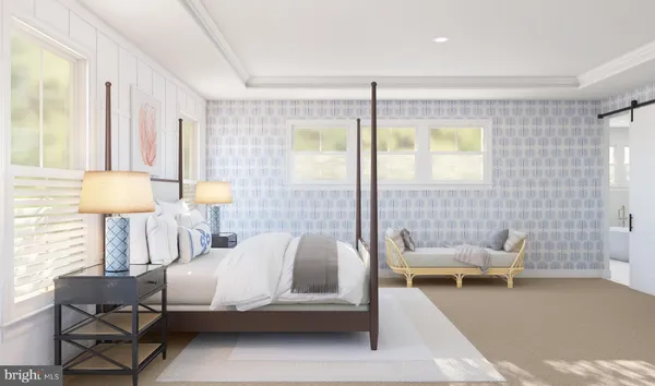 a bedroom with a bed and a couch
