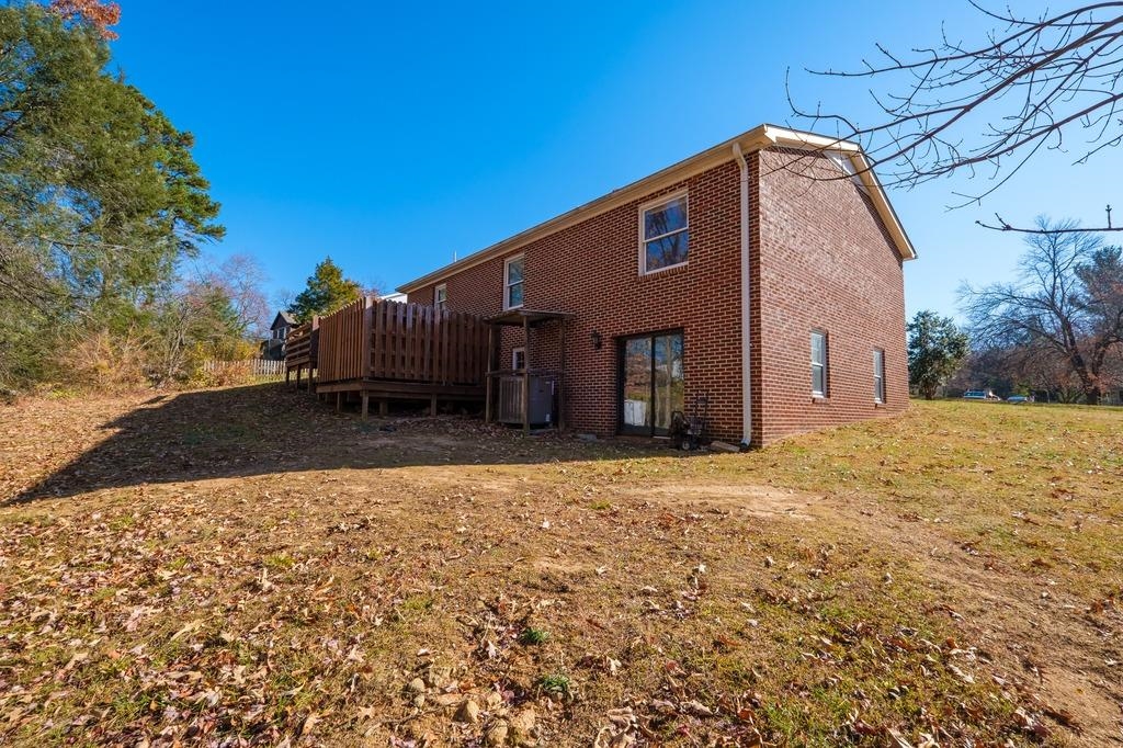 930 Claudius Court Crozet, VA 22932 - Photo 17 of 19 a front view of a house with a yard