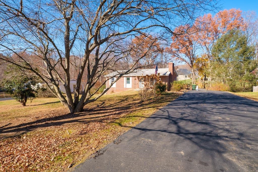 930 Claudius Court Crozet, VA 22932 - Photo 3 of 19 a view of yard with tree in it