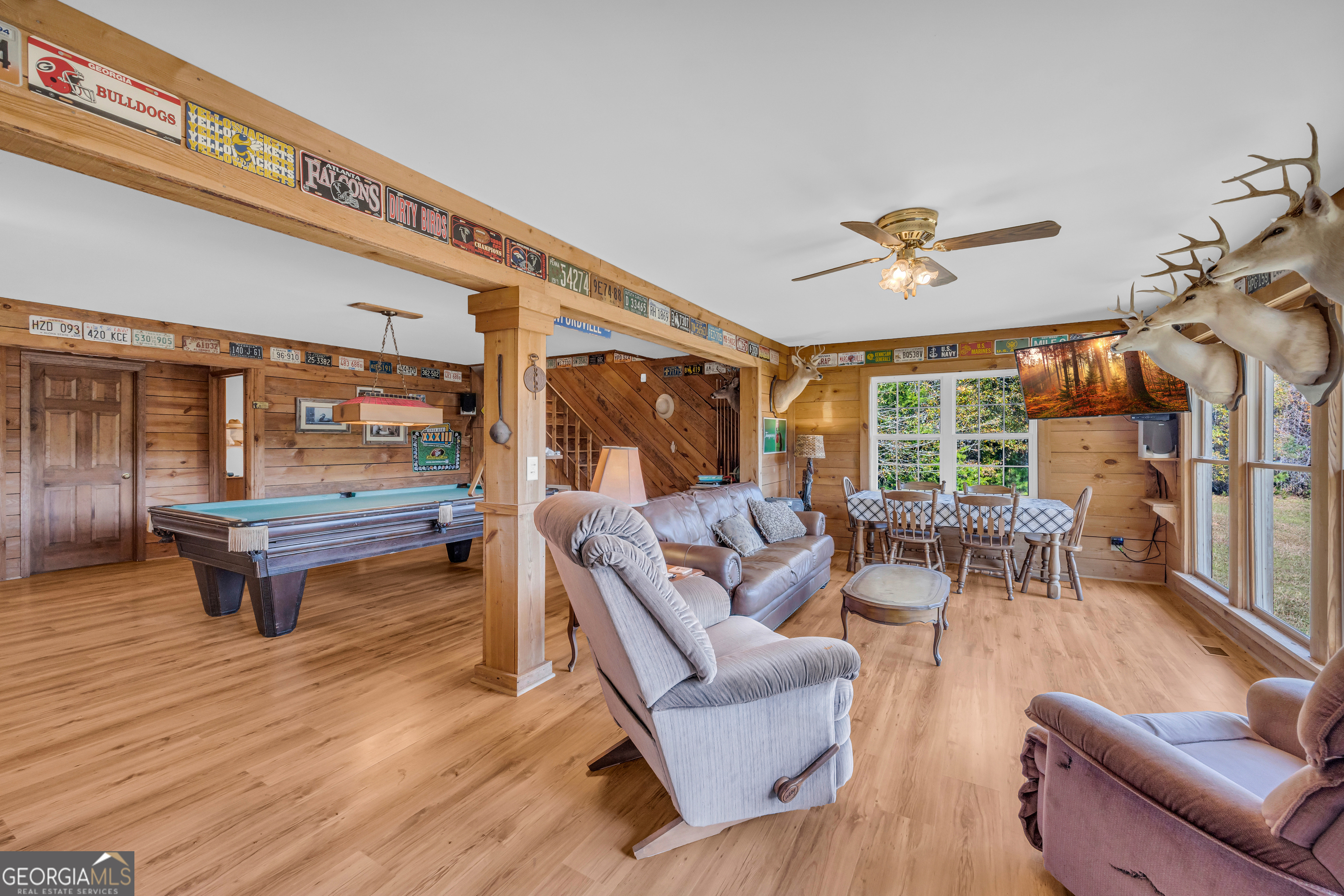 23824 Highway 22 Sparta, GA 31087 - Photo 21 of 94 a living room with furniture and a table with wooden floor