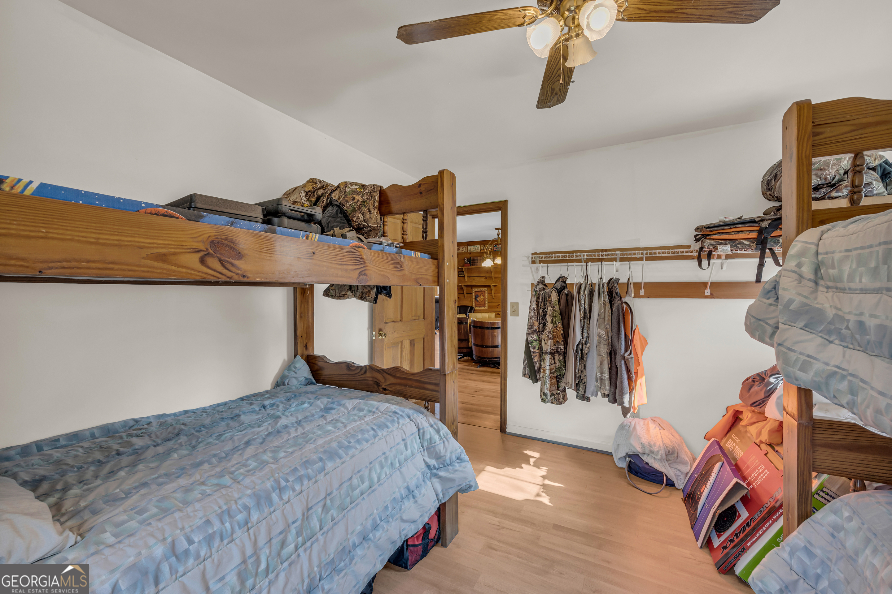 23824 Highway 22 Sparta, GA 31087 - Photo 30 of 94 a bedroom with a bed and wooden floor