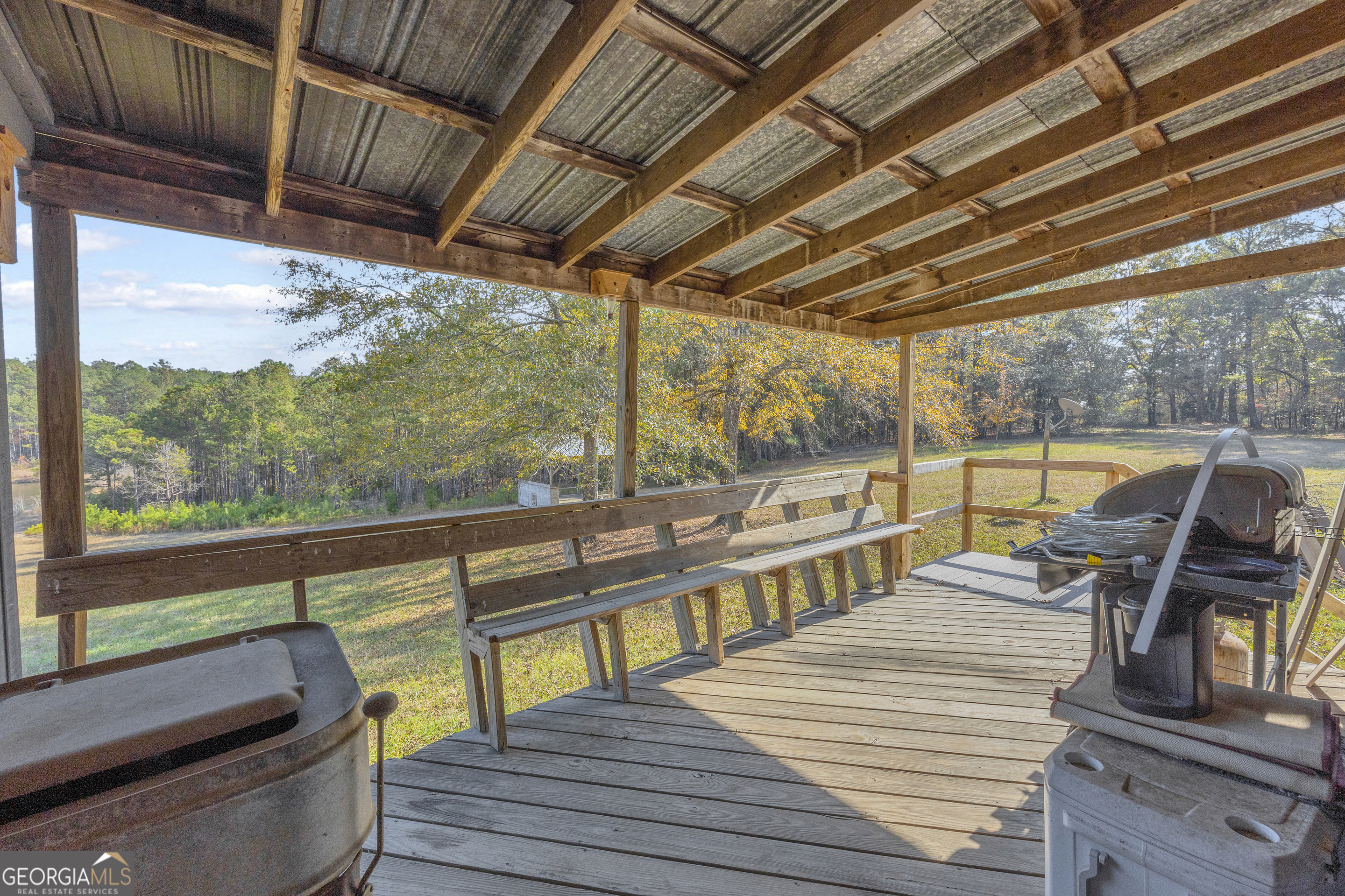 23824 Highway 22 Sparta, GA 31087 - Photo 37 of 94 a view of a balcony with wooden floor