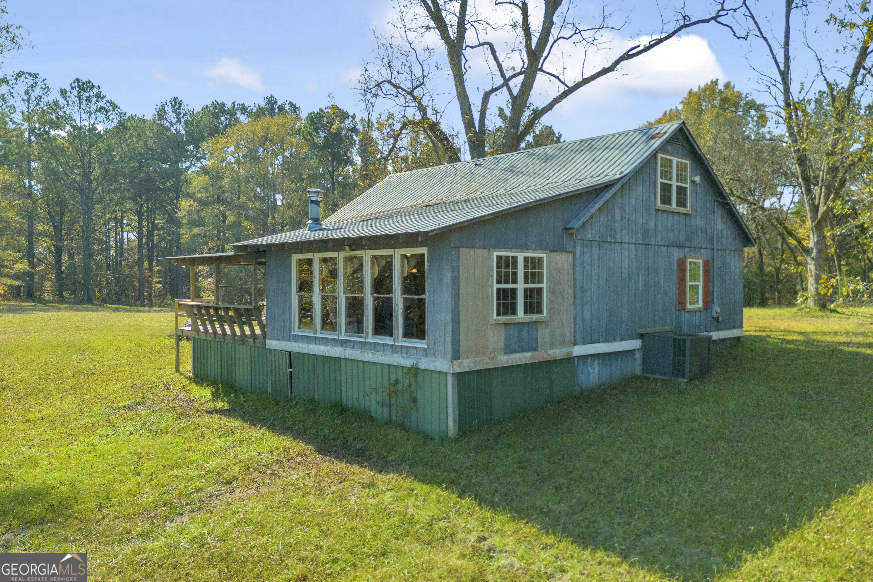 23824 Highway 22 Sparta, GA 31087 - Photo 75 of 94 a view of a house with a backyard