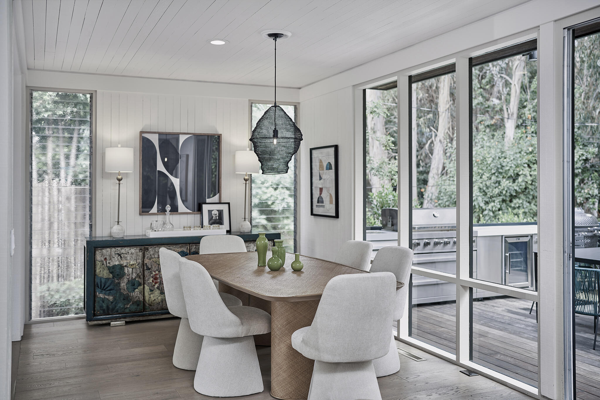 180 Hermosillo Road Montecito, CA 93108 - Photo 11 of 56 a dining room with furniture a chandelier and window