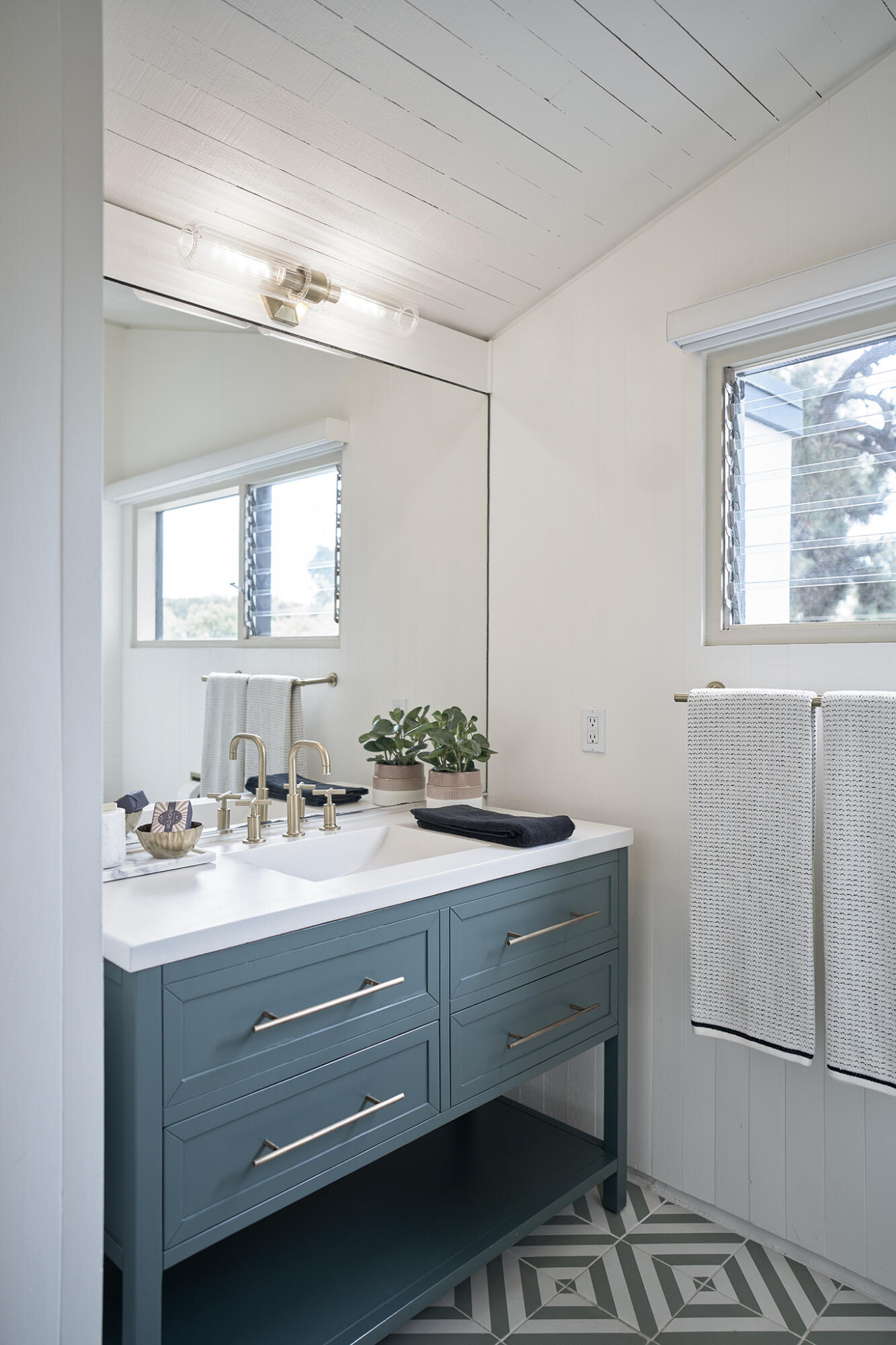 180 Hermosillo Road Montecito, CA 93108 - Photo 29 of 56 a bathroom with a sink and a mirror