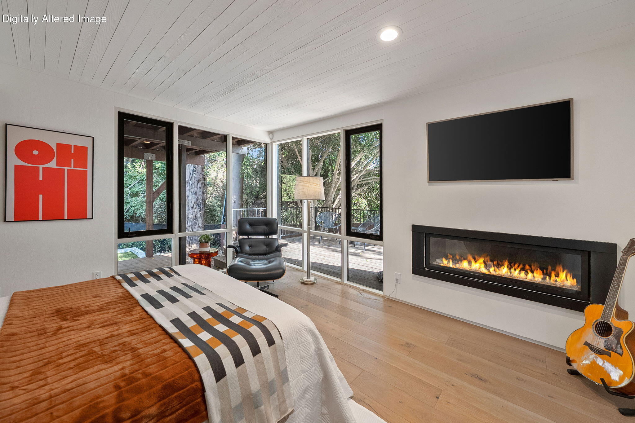 180 Hermosillo Road Montecito, CA 93108 - Photo 33 of 56 a bedroom with a bed and a fireplace