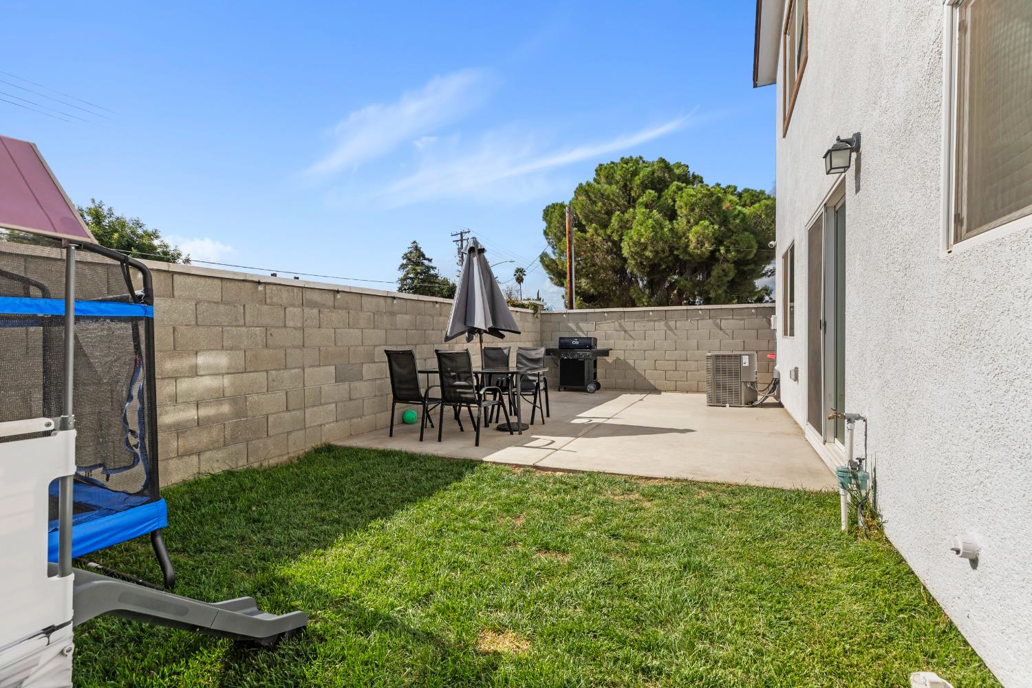 1202 Impression Street Turlock, CA 95380 - Photo 28 of 35 a view of yard with patio