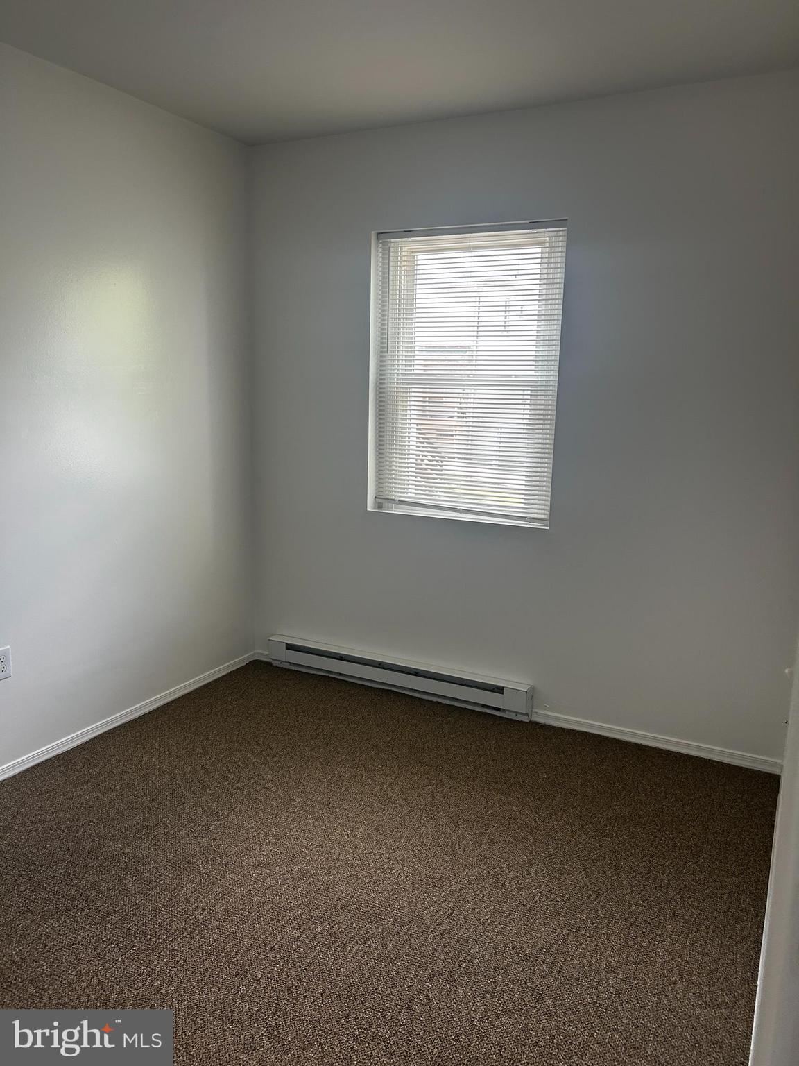 29 North Main Street, Unit 2E Spring City, PA 19475 - Photo 6 of 12 an empty room with a window