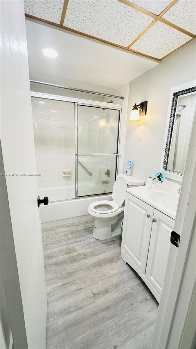 7100 Northwest 17th Street, Unit 111 Plantation, FL 33313 - Photo 15 of 18 a bathroom with a sink toilet and shower