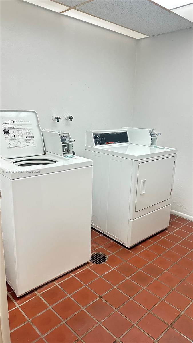 7100 Northwest 17th Street, Unit 111 Plantation, FL 33313 - Photo 17 of 18 a utility room with dryer and washer