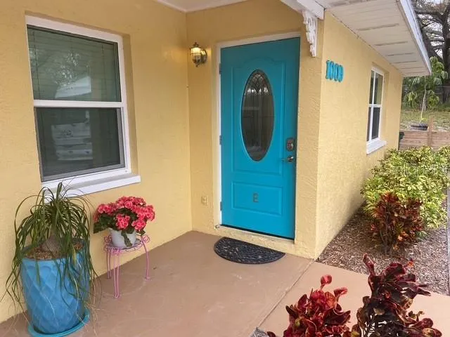 a bathroom with a sink and mirror