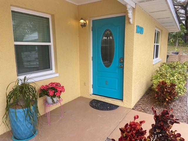 1009 Sumner Boulevard, Unit E Safety Harbor, FL 34695 - Photo 1 of 1 a bathroom with a sink and mirror