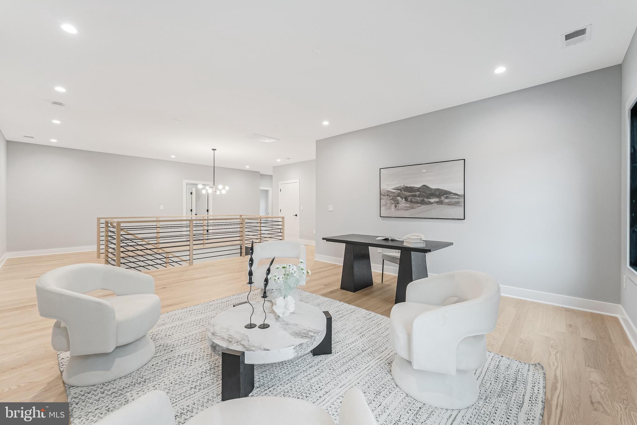 1052 Balls Hill Road McLean, VA 22101 - Photo 23 of 41 a living room with furniture and a wooden floor