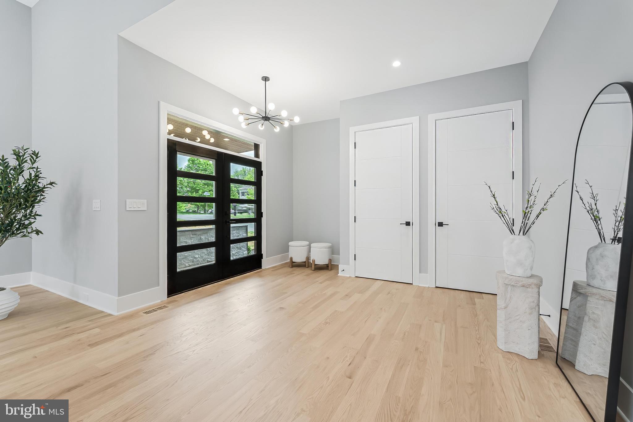 1052 Balls Hill Road McLean, VA 22101 - Photo 3 of 41 an empty room with windows and entrance