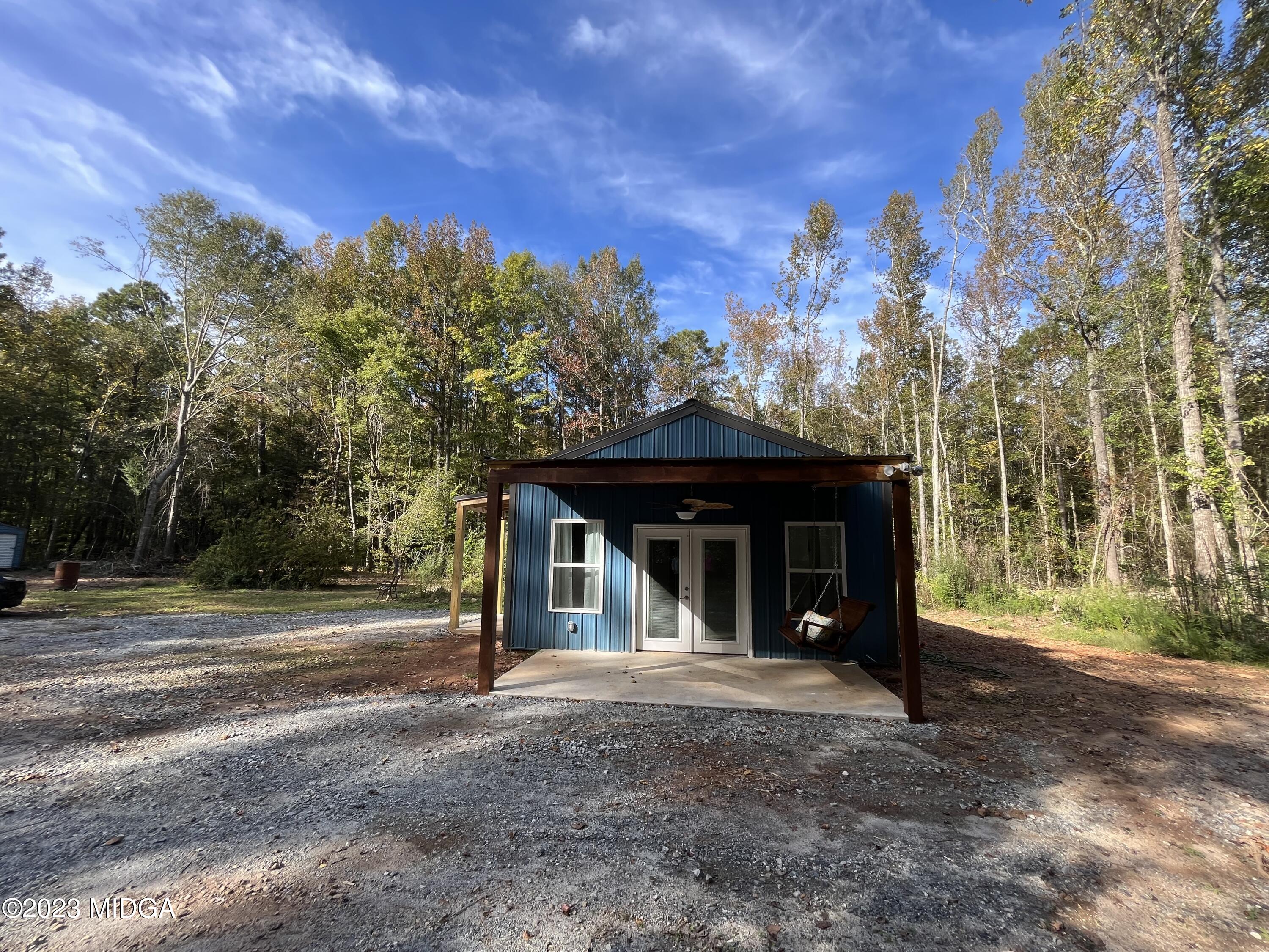 368 Mott Road Barnesville, GA 30204 - Photo 17 of 17 a view of a house with a yard