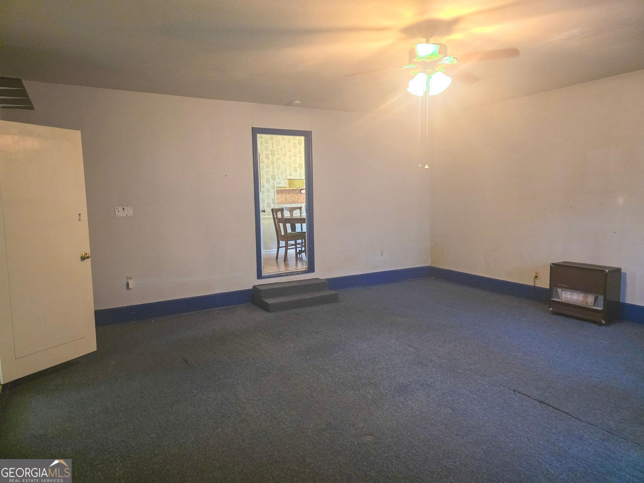 1712 Briarcliff Road Milledgeville, GA 31061 - Photo 12 of 38 a view of an empty room with a window