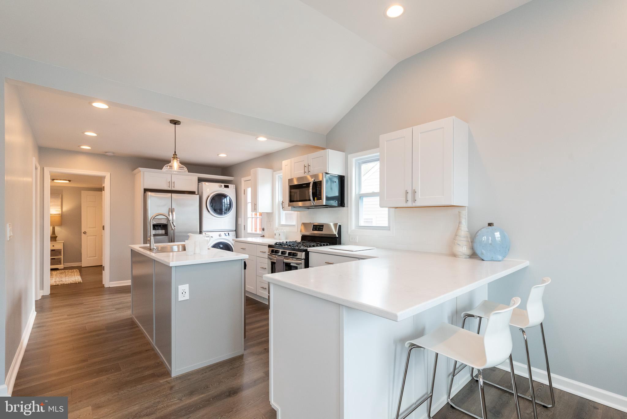 800 Rosedale Avenue Rosedale, MD 21237 - Photo 13 of 44 Stunning Kitchen w/Breakfast Bar & Island