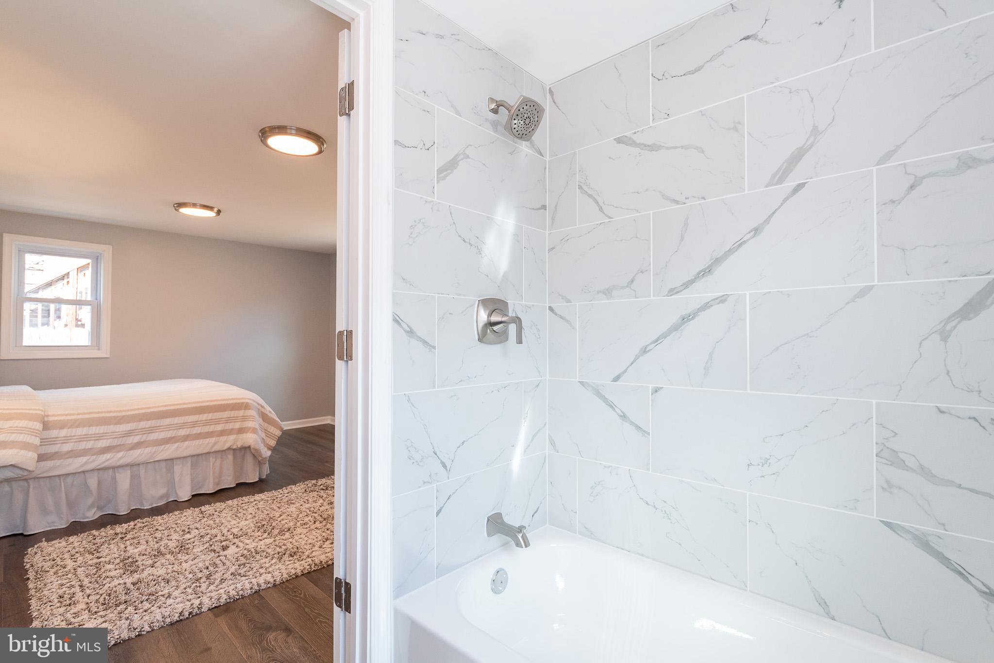 800 Rosedale Avenue Rosedale, MD 21237 - Photo 30 of 44 Sleek and Stunning Tilework