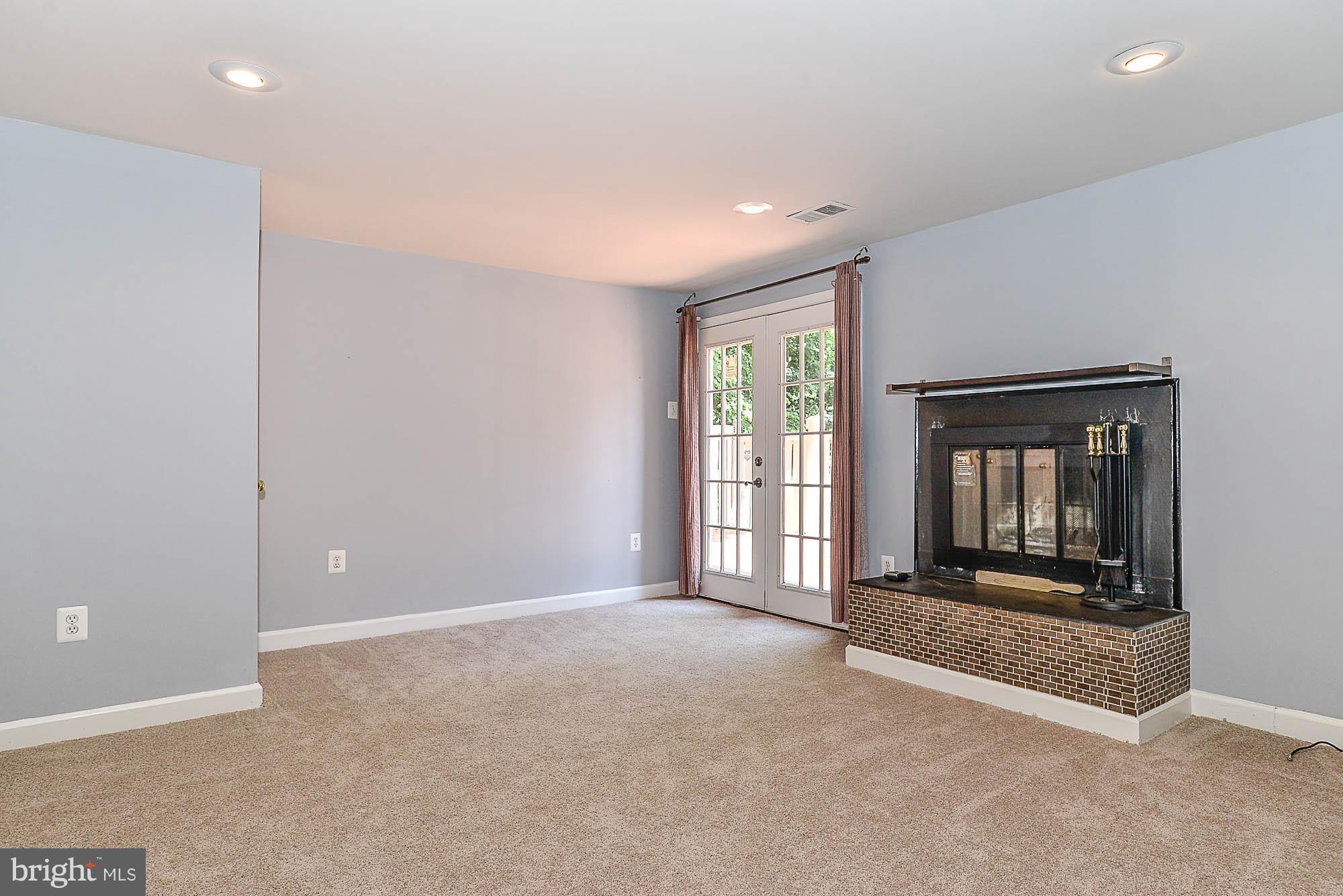 2488 Ridgehampton Court Reston, VA 20191 - Photo 23 of 30 Cozy Fireplace - Basement