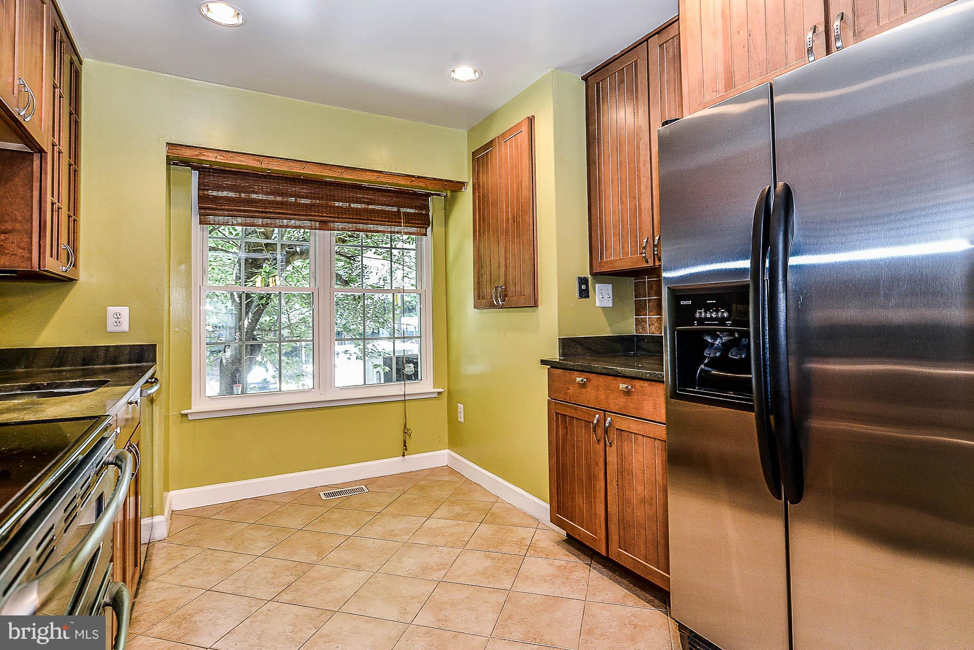 2488 Ridgehampton Court Reston, VA 20191 - Photo 6 of 30 Kitchen with Updated Tiles