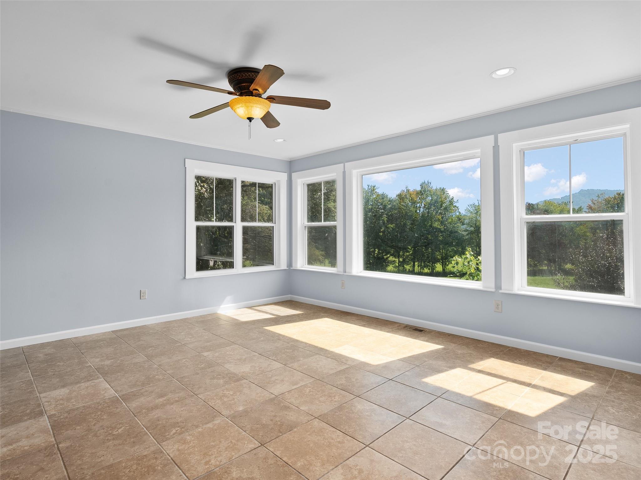 4912 Pigeon Road Waynesville, NC 28786 - Photo 19 of 38 a view of an empty room with a window