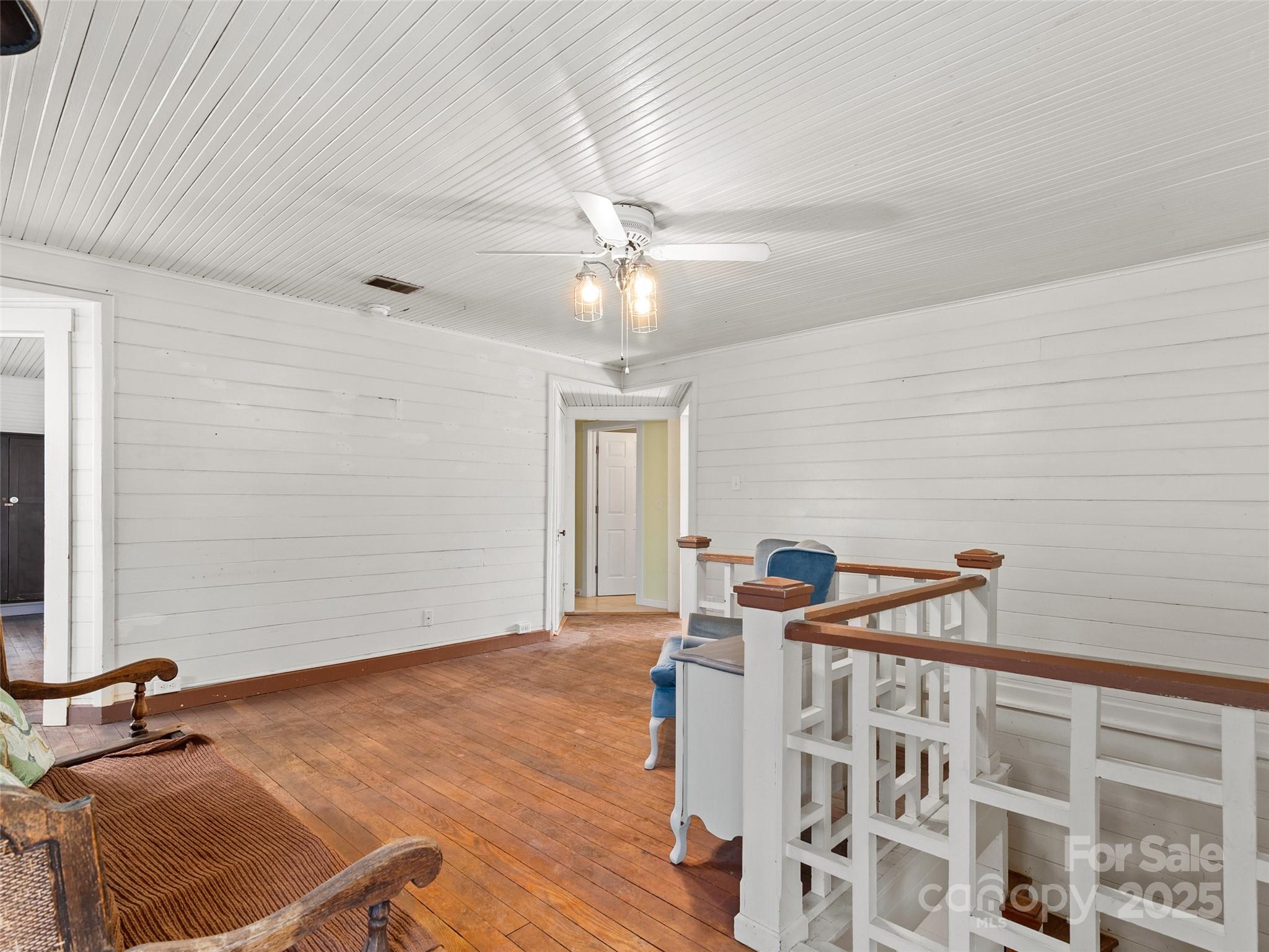 4912 Pigeon Road Waynesville, NC 28786 - Photo 23 of 38 a bedroom with furniture and window