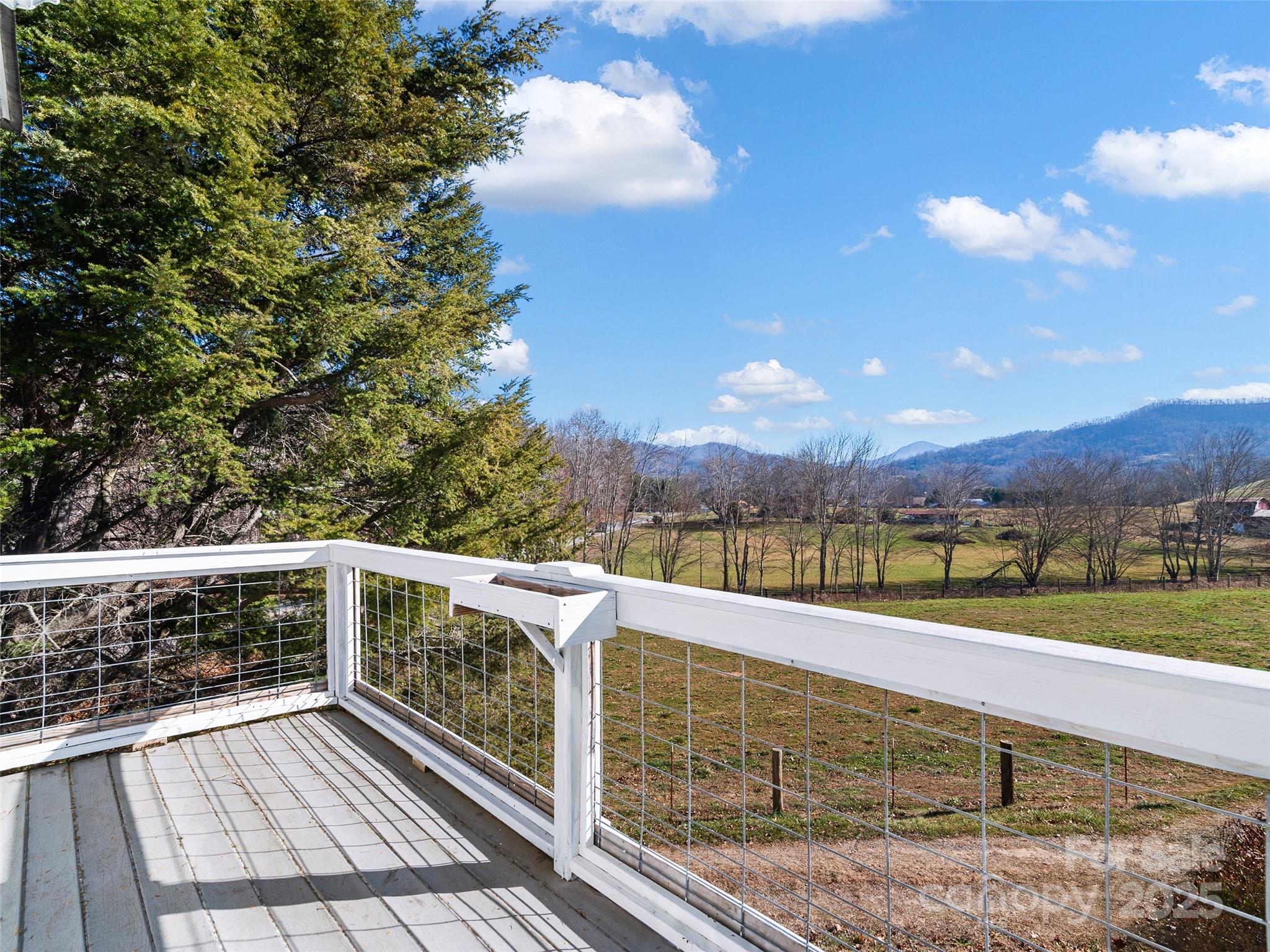4912 Pigeon Road Waynesville, NC 28786 - Photo 29 of 38 a view of a balcony with city view